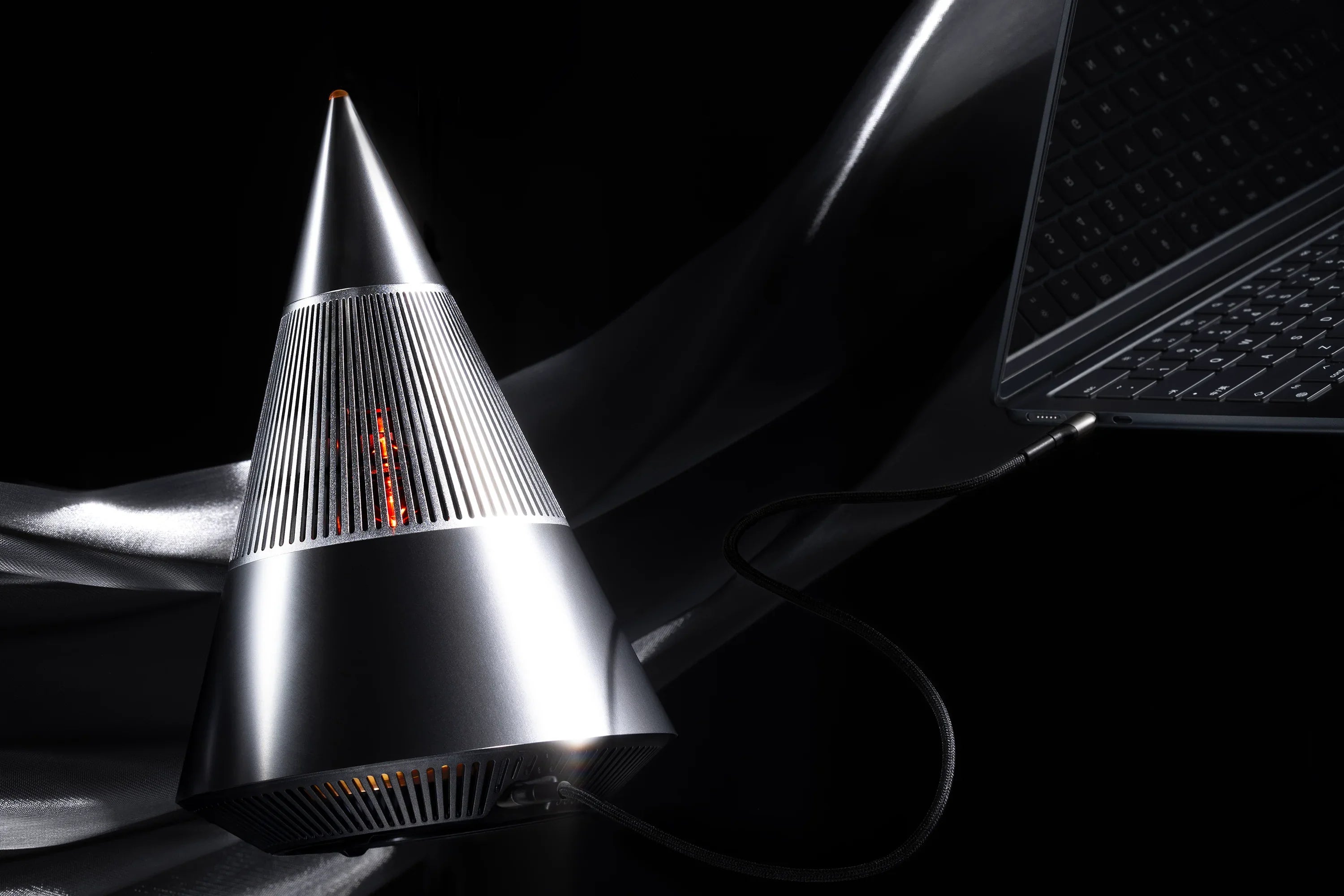 What high-end speakers deliver stereo-quality sound from a single unit using 360-degree design?